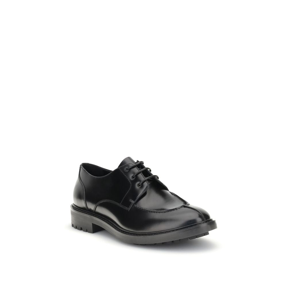 Saint Laurent Schwarze Kalbsleder-Bos-Taurus-Halbschuhe und -Derby-Schuhe